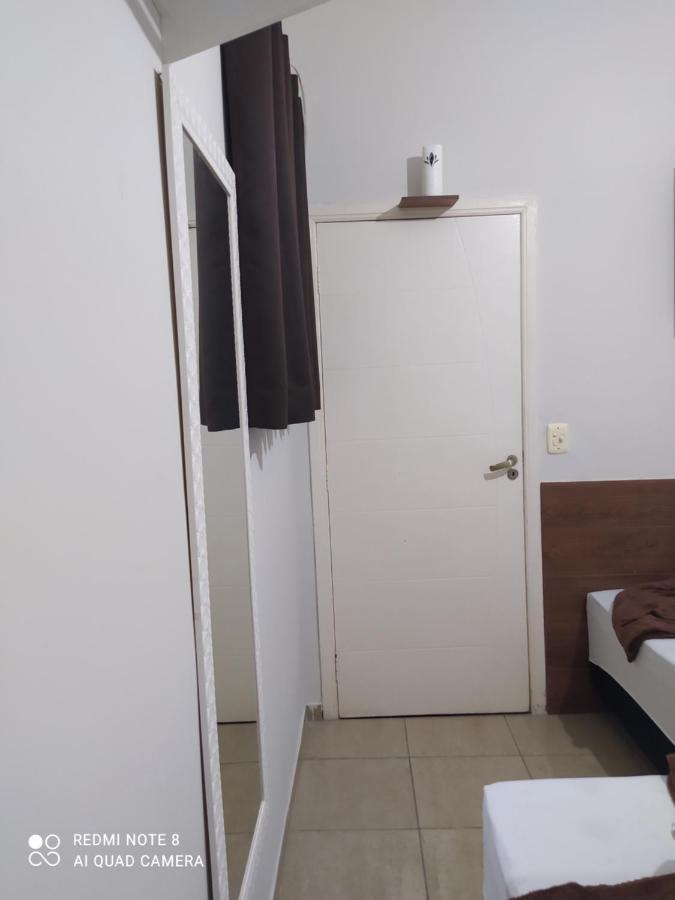 Quarto com ventilador,ar frigobar e garagem Aparecida (Sao Paulo) Exterior foto